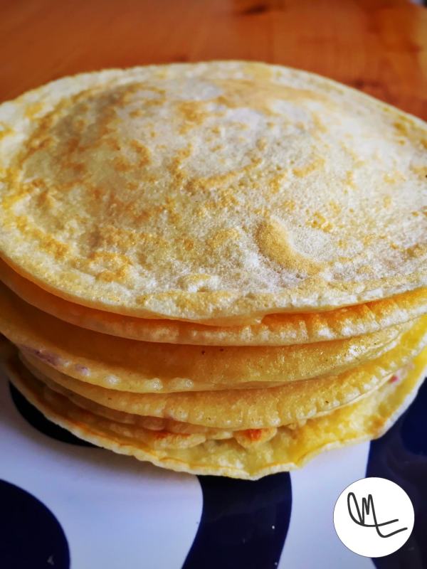 A stack of pancakes in a plate